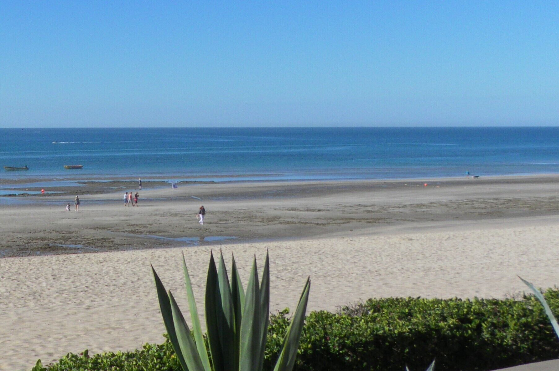On the beach, sun-loungers, beach towels