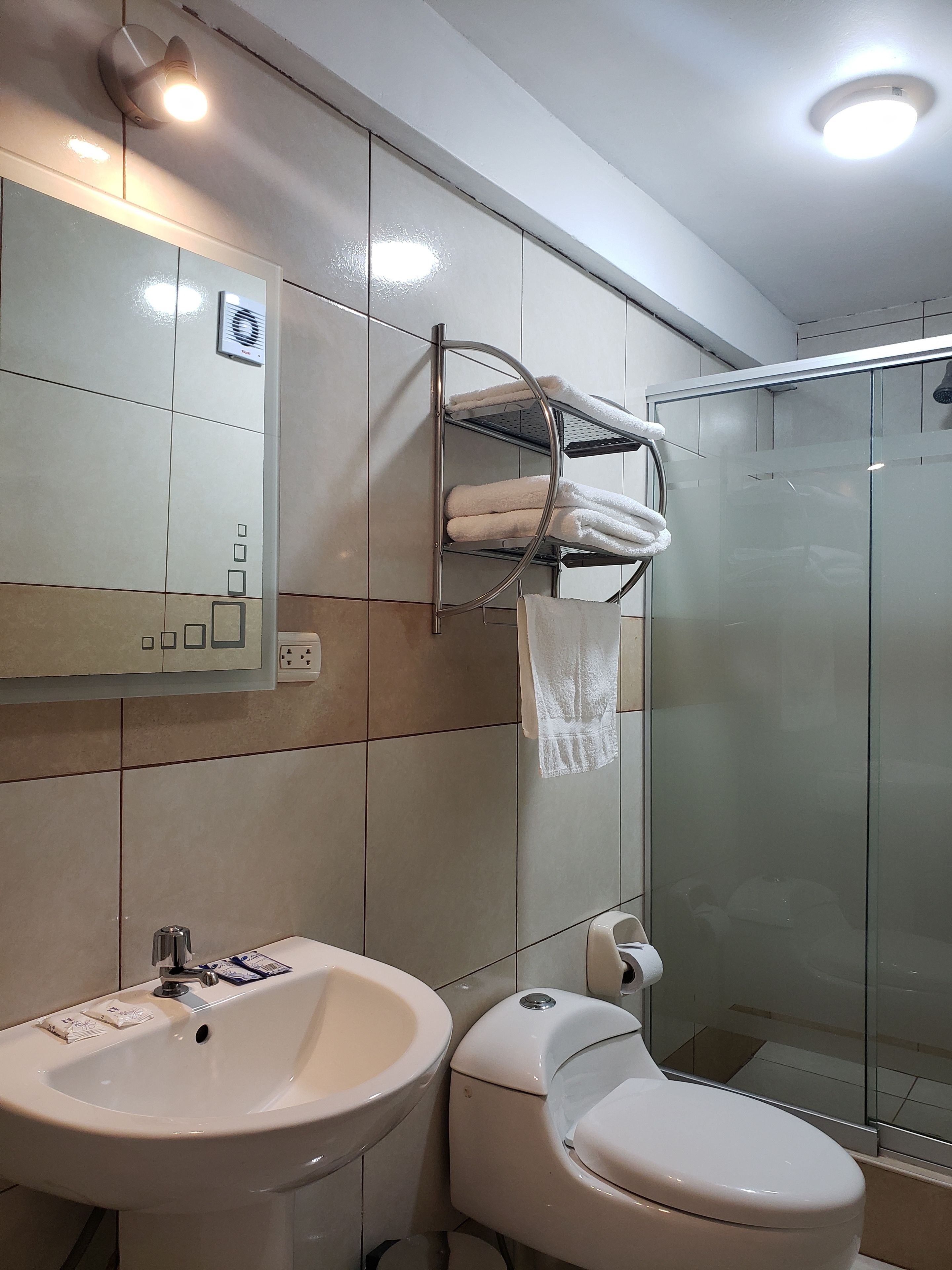 twin room | bathroom | shower, rainfall showerhead, free toiletries, hair dryer