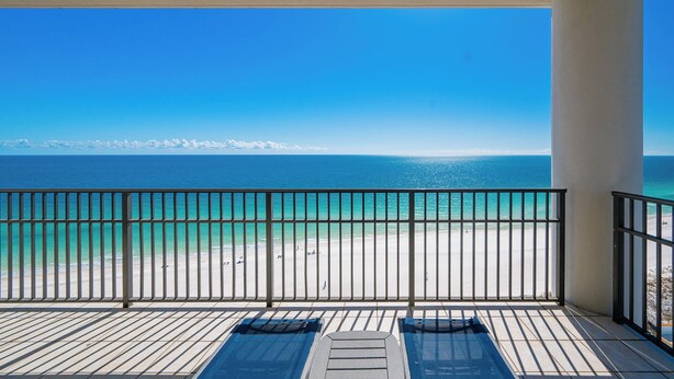 A balcony with a view of a beach and ocean. - The Oasis 1401 | Gulf-Front Corner Luxury Retreat (Orange Beach)