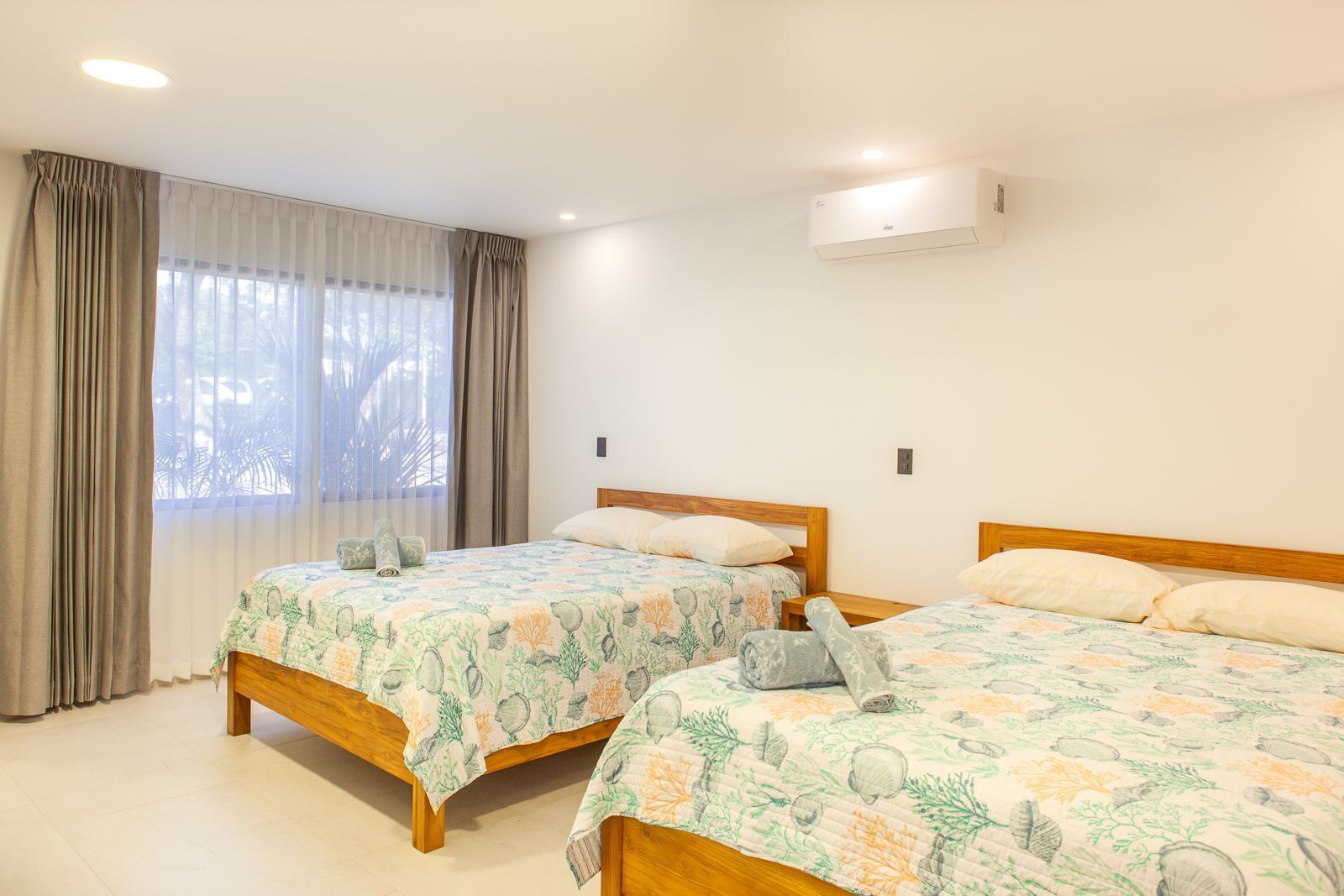 Deluxe House | Premium bedding, down comforters, individually decorated