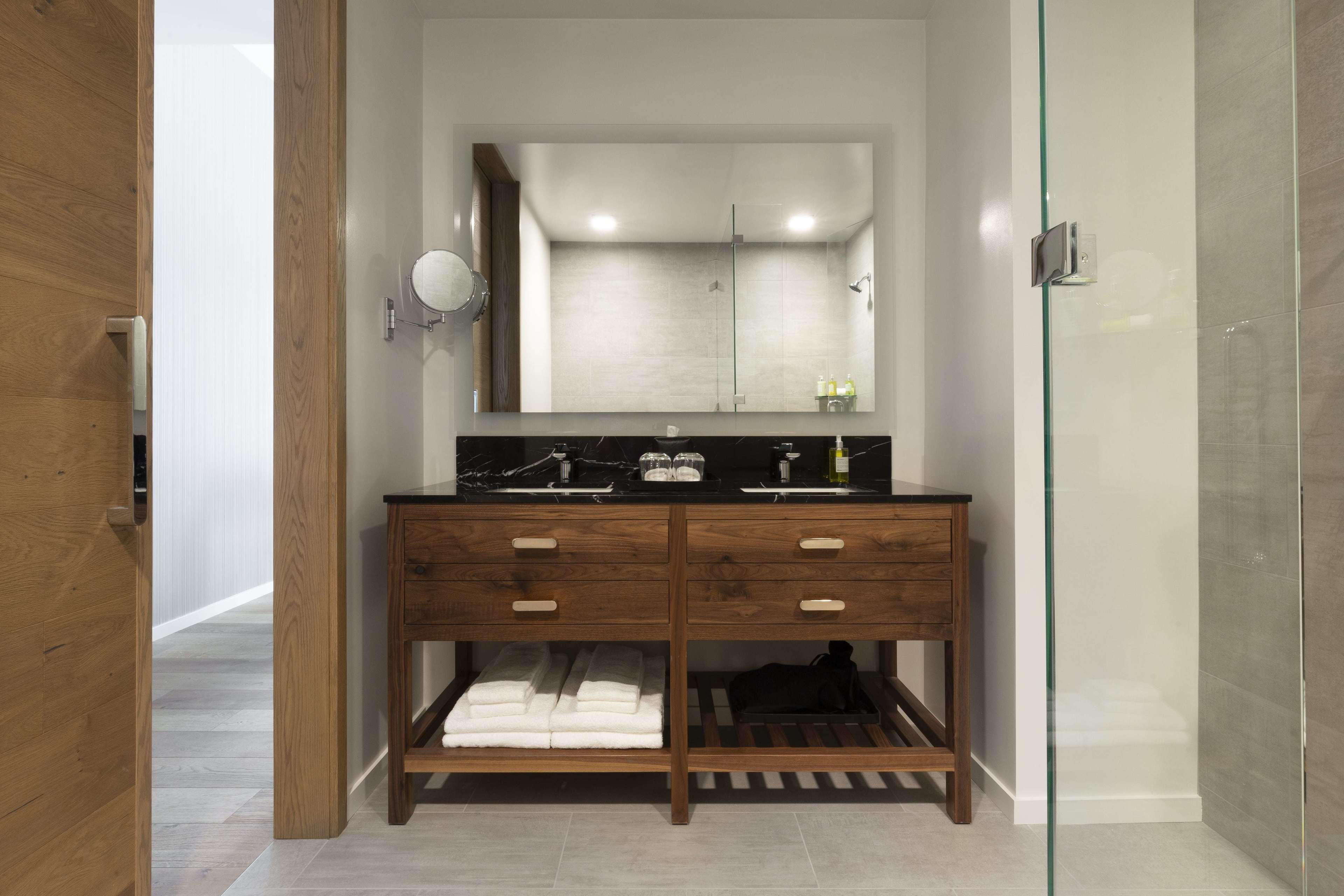 shower, designer toiletries, hair dryer, bathrobes