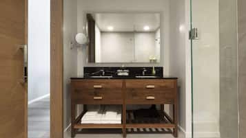 Shower, designer toiletries, hair dryer, bathrobes
