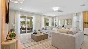 Casa Deluxe | Sala de estar | Smart TV de 42 pulgadas con canales digitales y Netflix