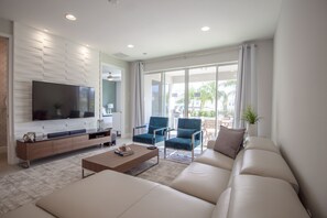 Encore Resort 6 Bedroom Vacation Home with Pool (2102) | Living room | 42-inch Smart TV with digital channels, Netflix, streaming services - Encore Resort (Kissimmee)