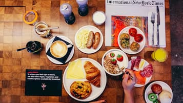 Daily buffet breakfast (USD 22 per person)