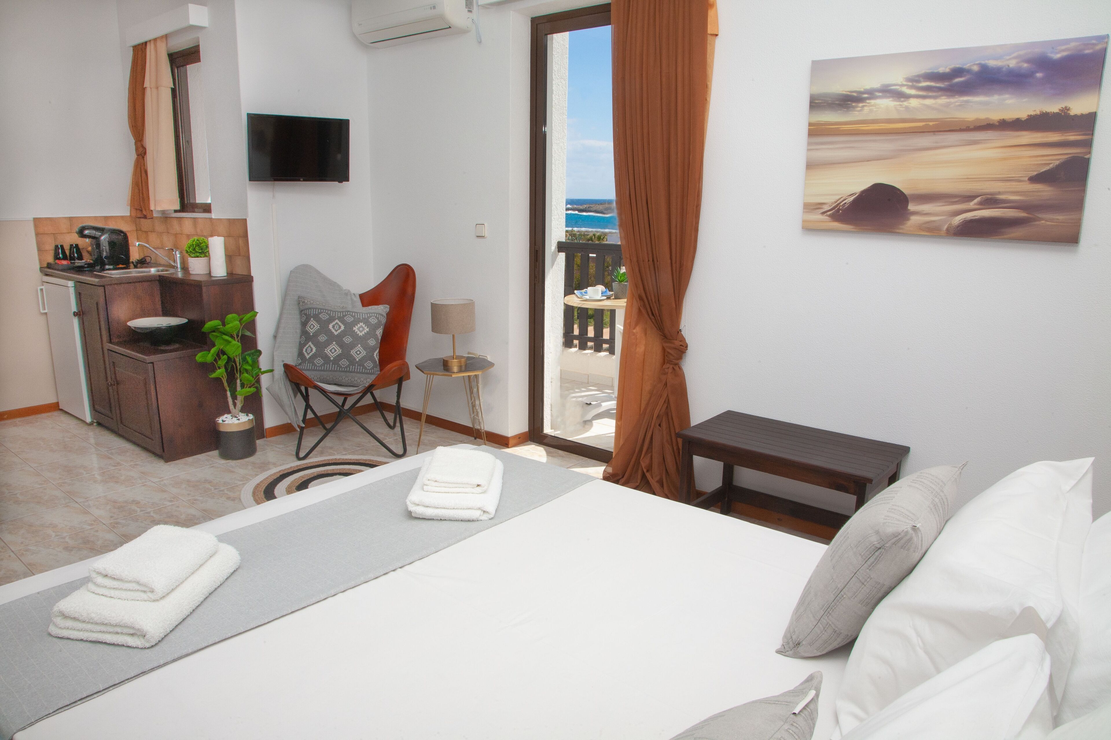 Double or Twin Room | Living area | Flat-screen TV