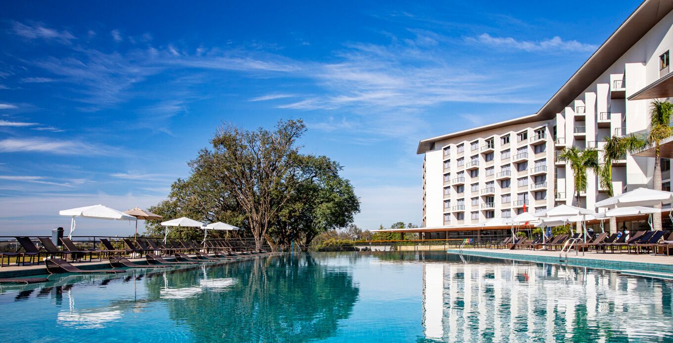 outdoor pool, pool umbrellas, pool loungers