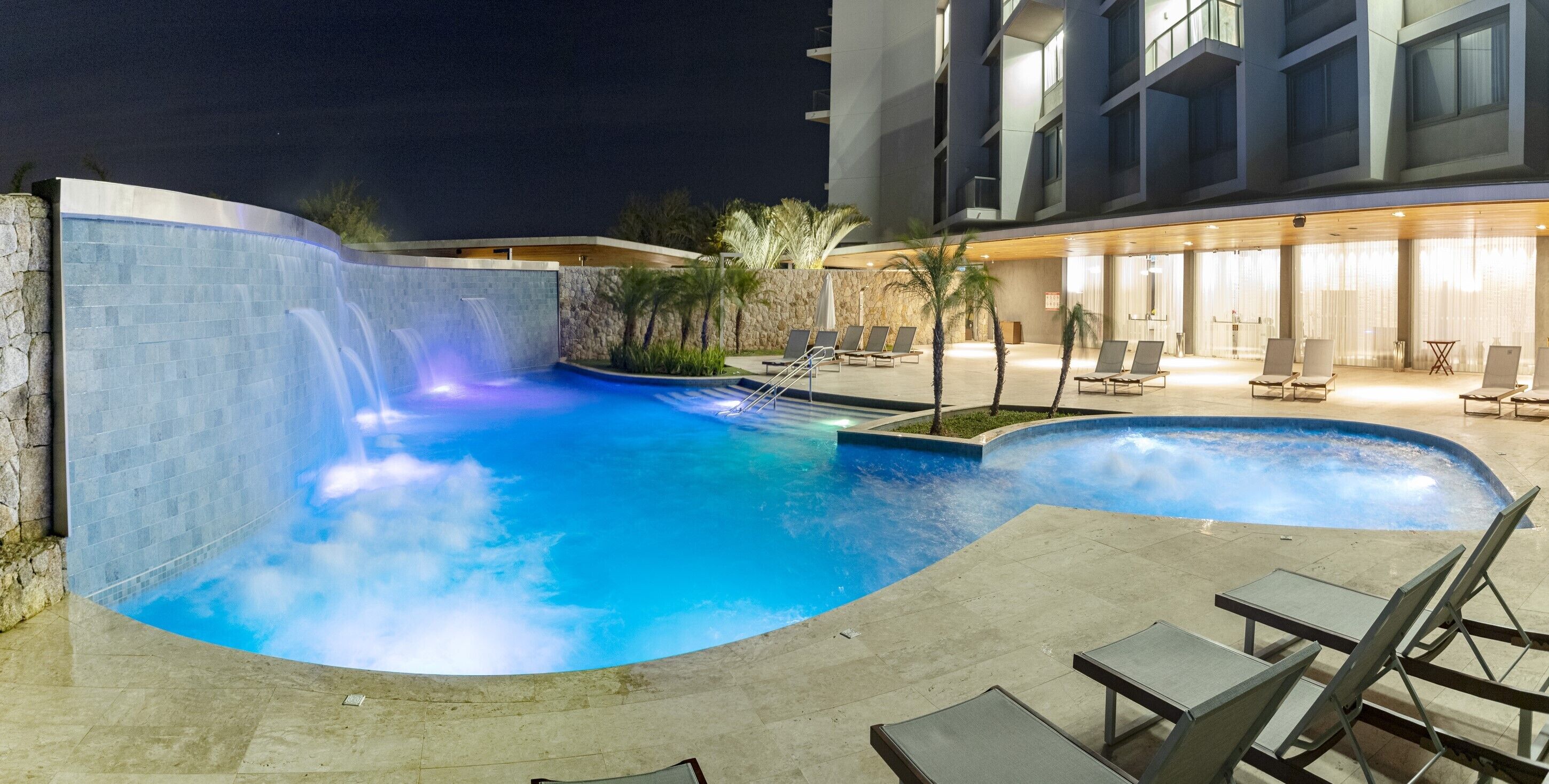 outdoor pool, pool umbrellas, pool loungers