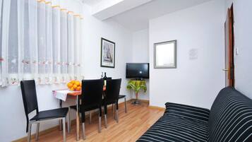 Apartment, 2 Bedrooms, Terrace, Sea View | 1 bedroom, desk, soundproofing, iron/ironing board