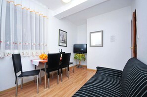 Apartment, 2 Bedrooms, Terrace, Sea View | 1 bedroom, desk, soundproofing, iron/ironing board