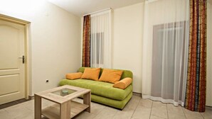 Apartment, 1 Bedroom, Balcony, Partial Sea View | Living area | Flat-screen TV - Apartments Ljoljic (Kotor)
