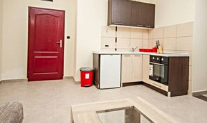 Apartment, 2 Bedrooms, Sea View | 1 bedroom, desk, soundproofing, iron/ironing board