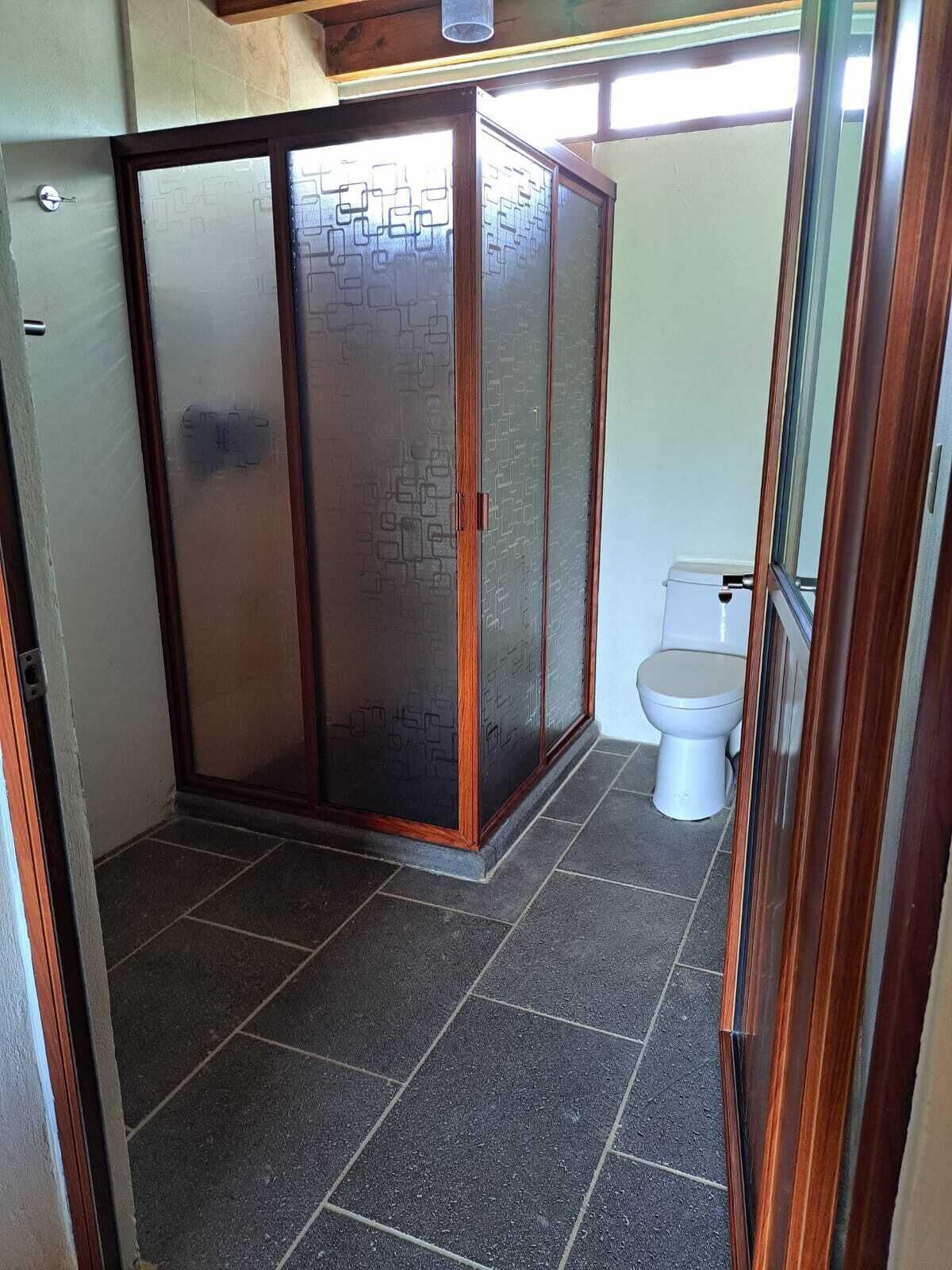 traditional cabin, hot tub | bathroom | shower, towels