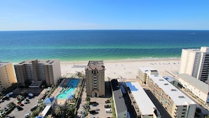 A resort with a pool, beach, and ocean view. - Gulf Views - Sleeps 6 | Gulf Shores | Direct Beach Access (Gulf Shores)