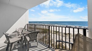 A balcony with a view of the beach and ocean. - Island Sunrise 362-The Beach is Where You Need to Be! (Gulf Shores)