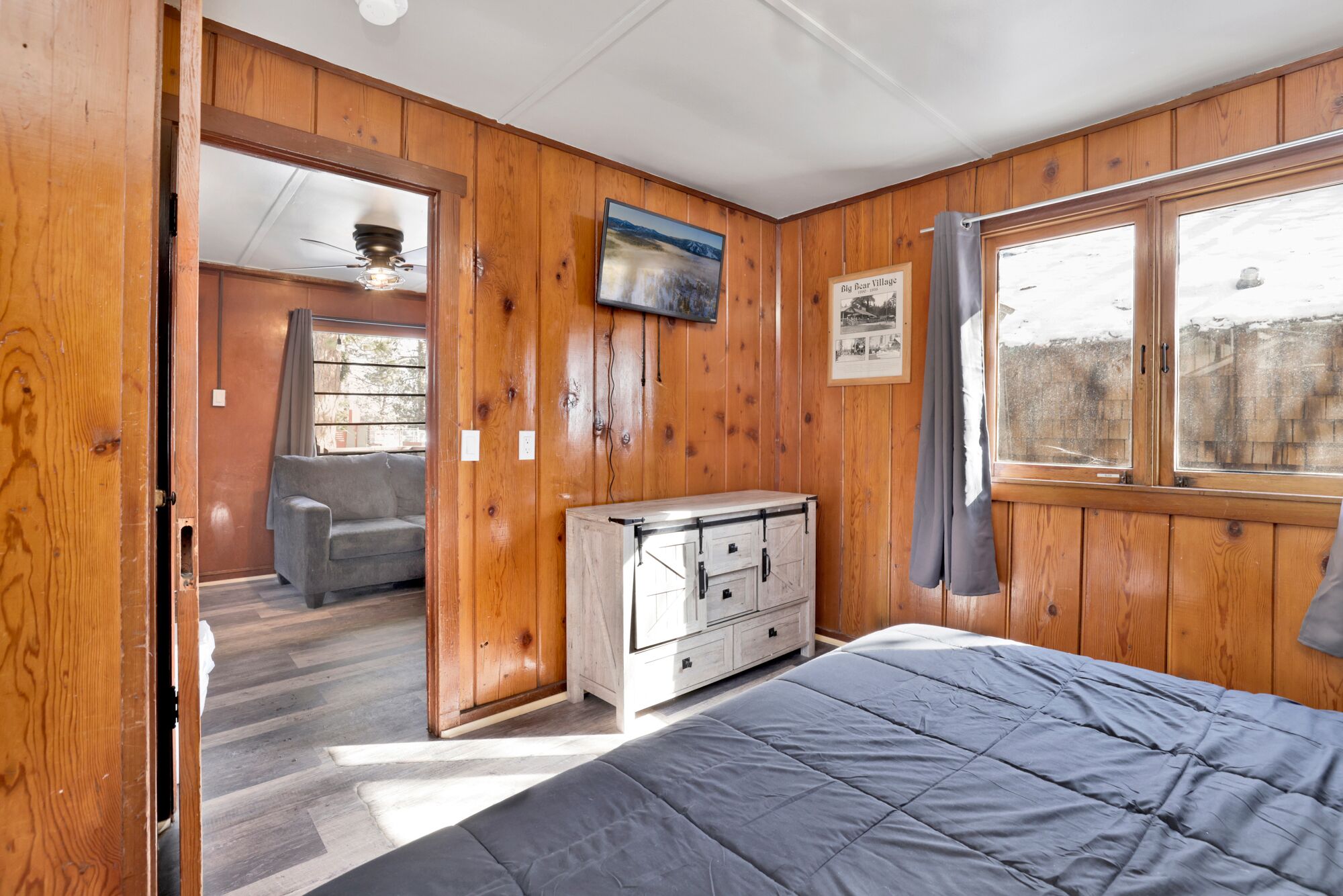 A king-size bed with a TV perfect for a movie night.