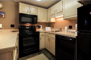 Fridge, oven, stovetop, coffee/tea maker