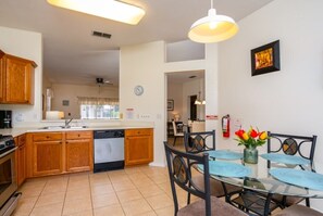 Fridge, microwave, oven, stovetop - Homely Golf View 3 Bedroom Villa (Davenport)