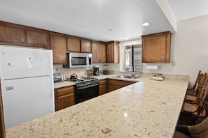 Fridge, microwave, oven, stovetop
