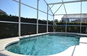 A heated pool, sun loungers