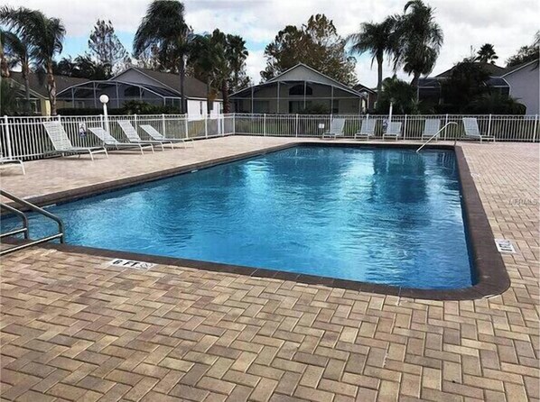 A heated pool, pool loungers