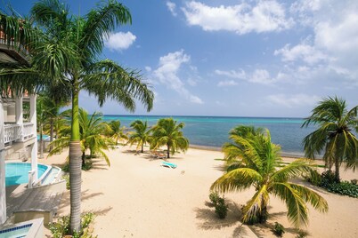 Beachfront luxury with private Rooftop Pool in private Community