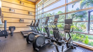 A gym with treadmills, stationary bikes, and weight machines. - Waterfront Townhome | 4 Balconies, Gorgeous Views (Ruskin)