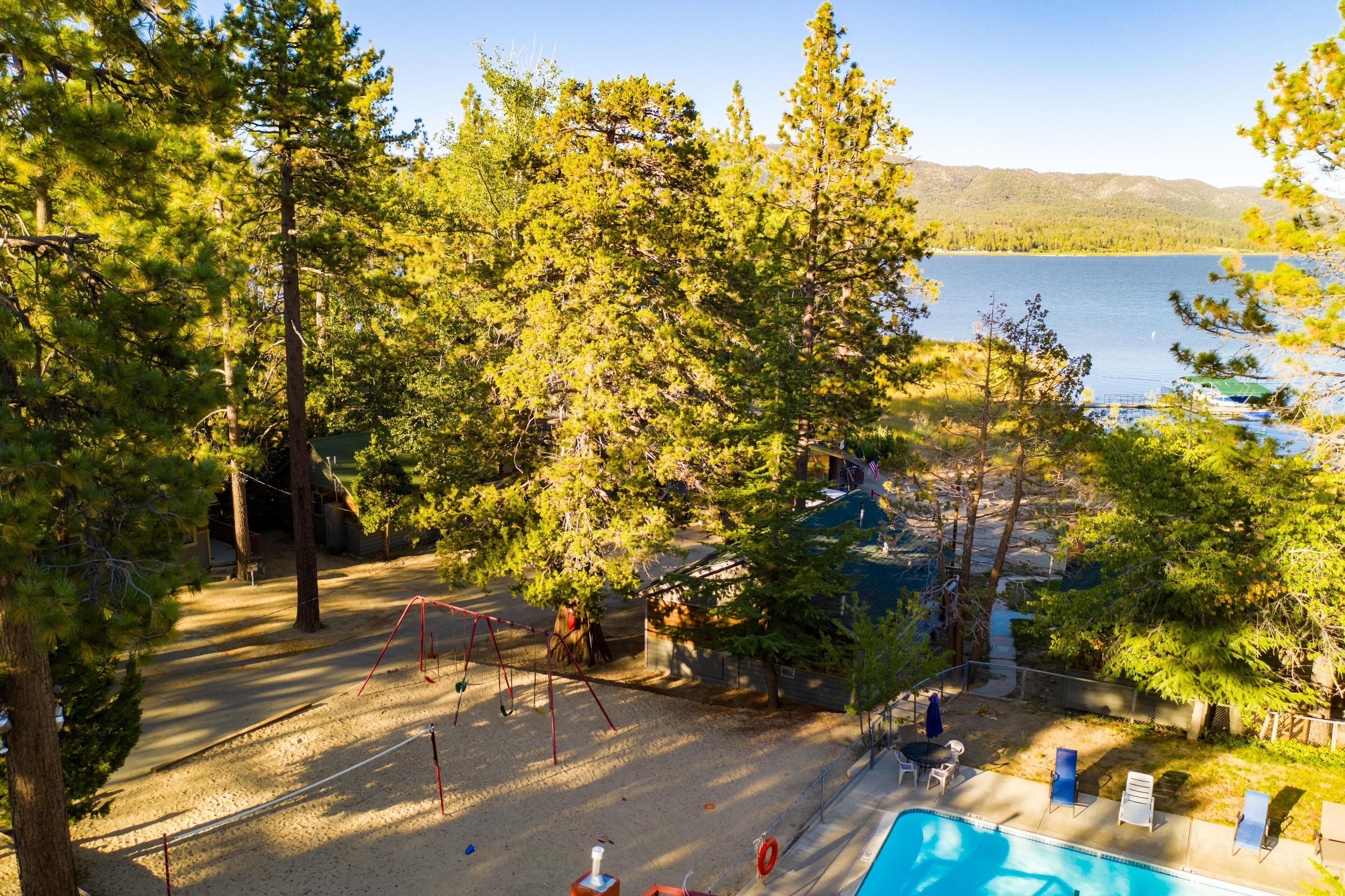Enjoy the day with your family or friends at the picnic area that is near the lake, surrounded by beautiful tall pine trees.