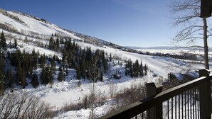 A snowy mountain landscape with a clear sky.