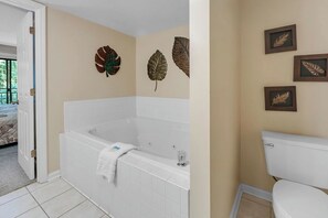 Shower, jetted tub, towels