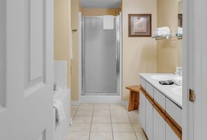 Shower, jetted tub, towels