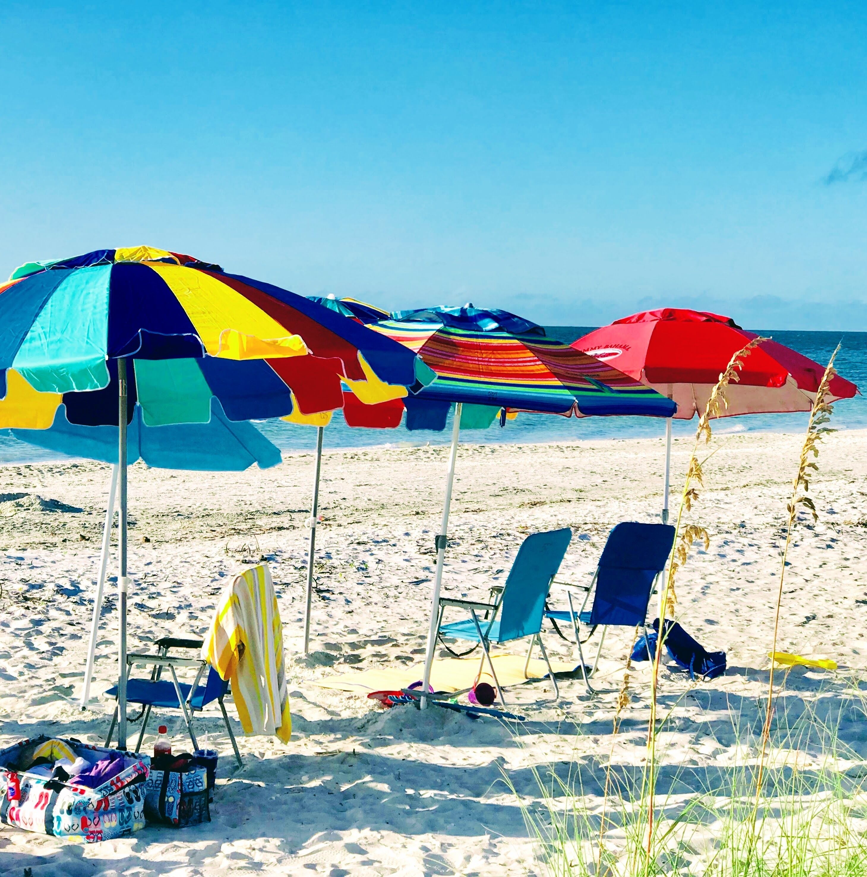 On the beach, beach umbrellas, beach towels