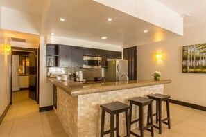 Fridge, microwave, stovetop, coffee/tea maker