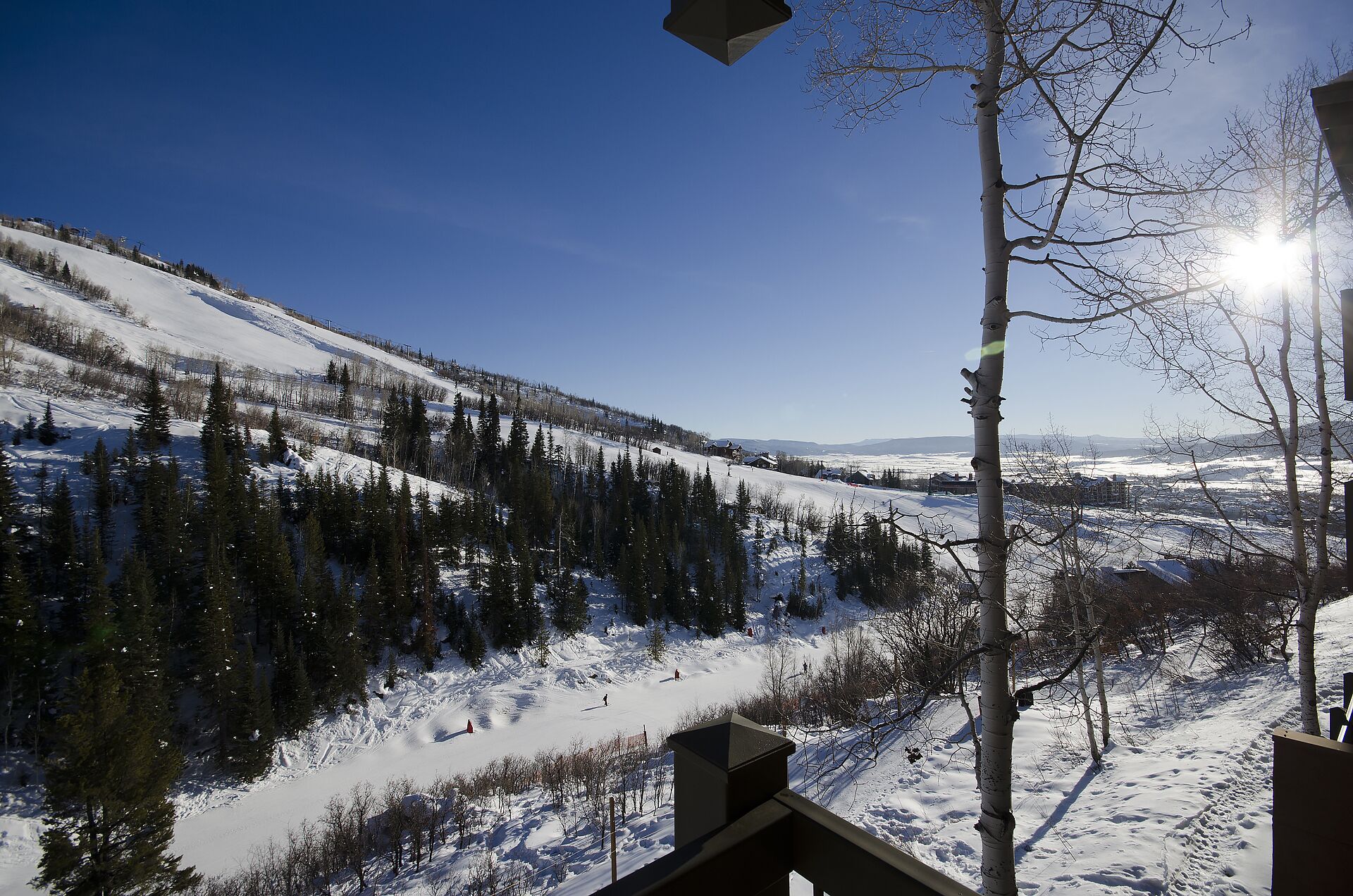 A snowy mountain landscape with a clear sky.