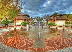 Stroll through the tranquil courtyard, surrounded by traditional buildings with covered porches.
