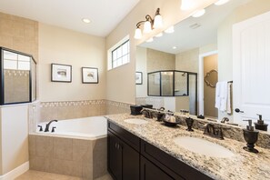 Combined shower/bathtub, hair dryer, towels