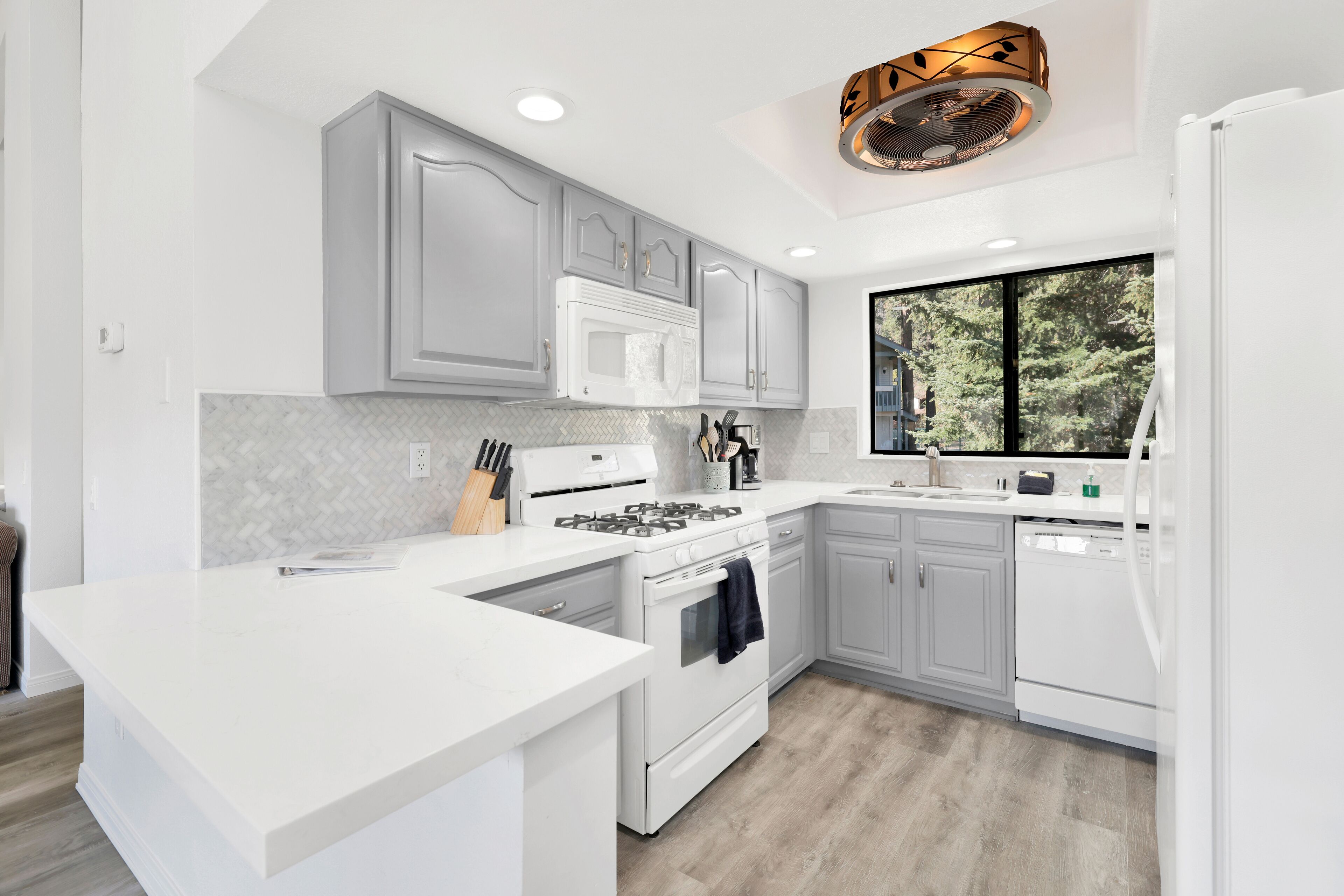 Modern, fully equipped kitchen with updated appliances, ample counter space, and a bright open layout perfect for preparing meals and enjoying time together.
Tags: Kitchen, Fully Equipped Kitchen, Modern Kitchen