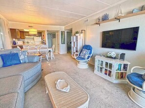 DVD player - Festive, fun 2 bedroom oceanfront condo with free WiFi, unique and sunny decor, and a beautiful view of the ocean located in quiet midtown and just a few steps to the beach! (Ocean city)