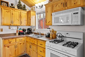 Fridge, microwave, oven, stovetop - Romantic Getaway - Walk to Dining & Hiking, Hot Tub, Barbecue (Big Bear City)