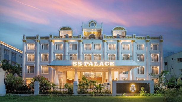 A hotel with a grand entrance, multiple floors, and a well-lit facade. - Hotel SS Palace (Rameshwaram)