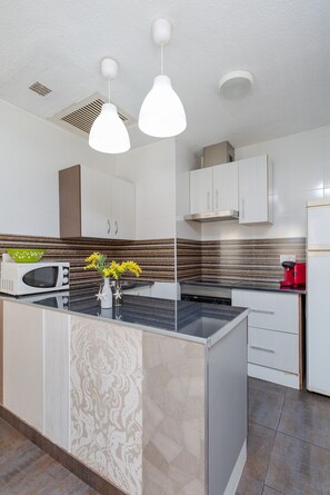 Fridge, microwave, oven, dishwasher