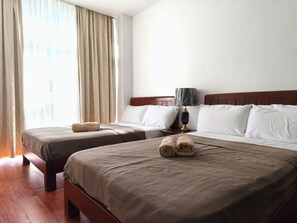 家庭公寓式客房, 城市景观 | 高档床上用品、羽绒被、遮光窗帘、隔音