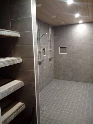 Shower, rainfall showerhead, hair dryer, towels