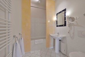 Hair dryer, towels, soap, toilet paper
