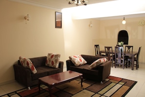 Studio | Living room | LCD TV - Delta Suites (Kampala)