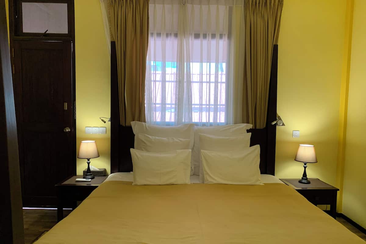 superior room (with free return airport transfer) | premium bedding, minibar, desk, laptop workspace