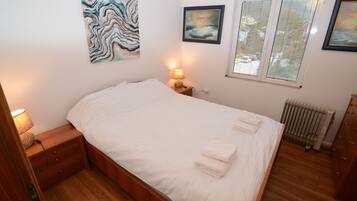 Apartamento, banheiro privativo, vista para a montanha | 1 quarto, roupas de cama de algodão egípcio