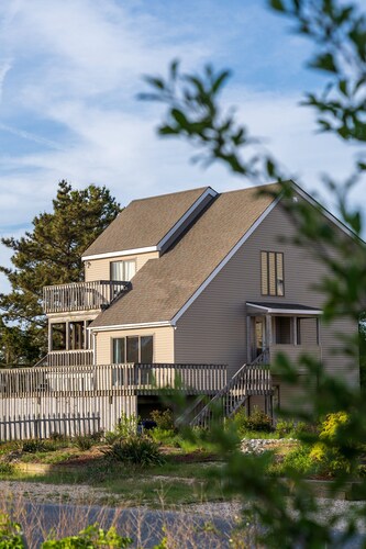 EXCLUSIVELY YOURS! Private Beach Path, Double Water Access, and Dog Friendly.