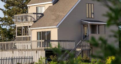 EXCLUSIVELY YOURS! Private Beach Path, Double Water Access, and Dog Friendly.