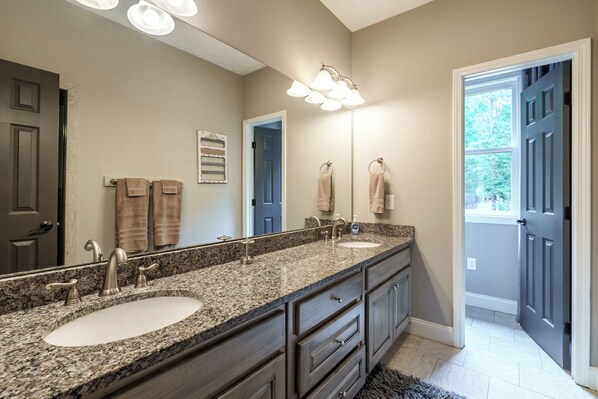 A bathroom with two sinks, a large mirror, and a vanity with drawers. - WOW! 20% Off Until 2027, Huge View, Pointe Lot, Dock, Pontoon, 7 Bedroom; WOW (Greensboro)